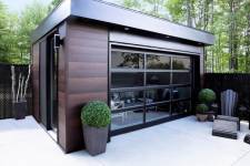 Maison de jardin bord de piscine de style contemporain avec porte de garage toute vitrée California, 12' x 7', profilé d’aluminium Noir, verre Clair